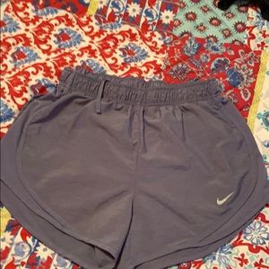 Purple Nike running shorts